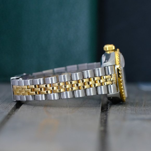 ROLEX LADIES DATEJUST GOLD STEEL CREAM ROMAN DIAL DIAMOND BEZEL 26MM WATCH 69173